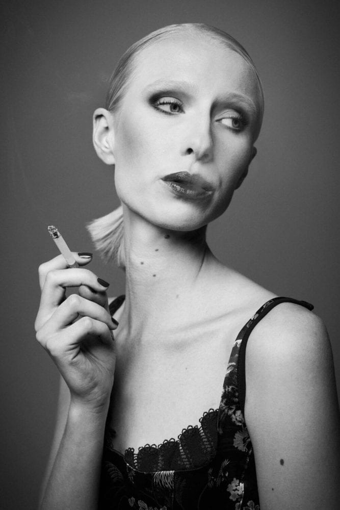 Black and white portrait of a smoking woman
